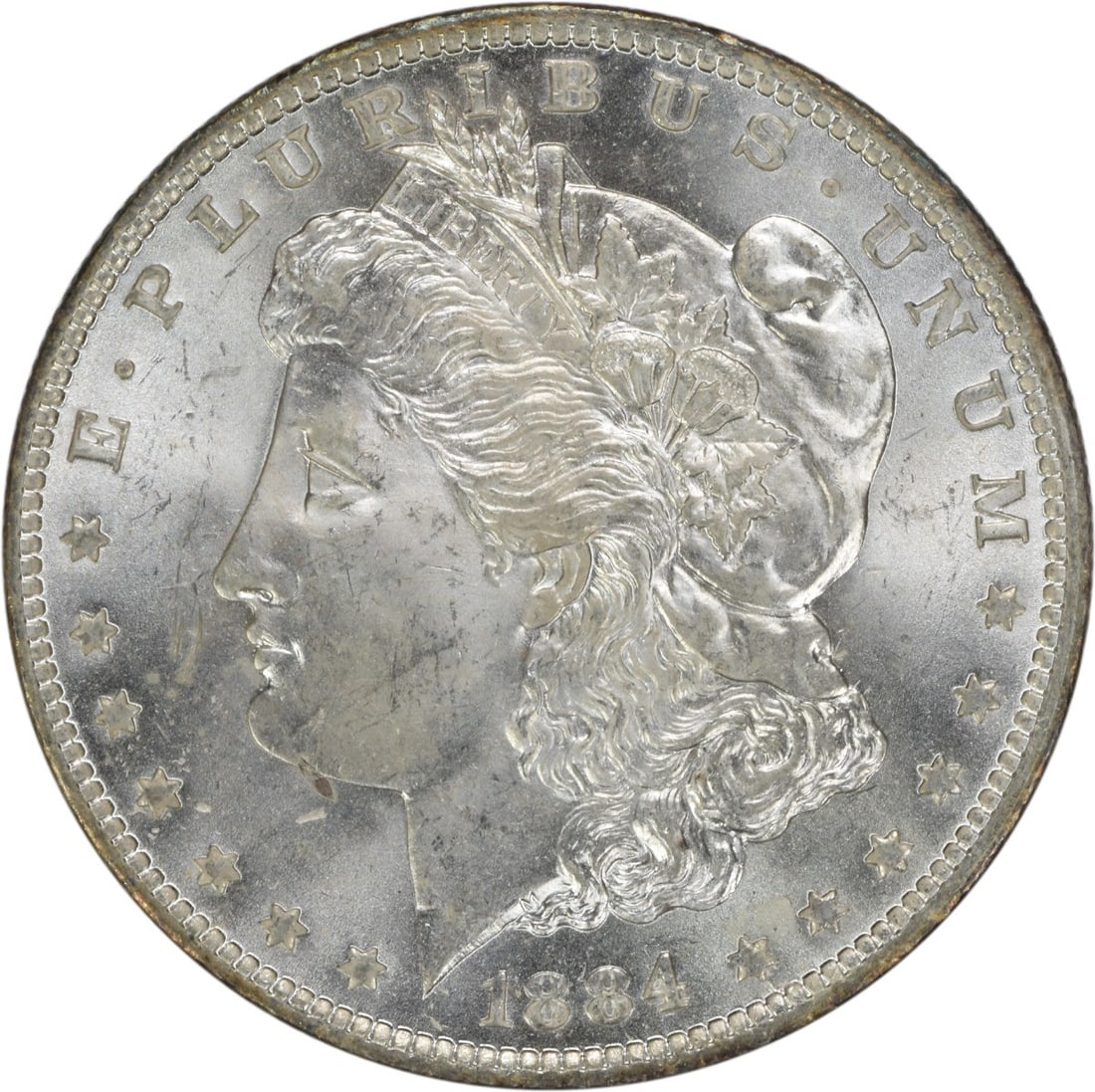 Brilliant Uncirculated 1884-O Silver Morgan Dollar Uncertified Coin: Brilliant Uncirculated 1884-O Silver Morgan Dollar Uncertified Coin This is an 1884-O Morgan Silver Dollar in brilliant uncirculated condition. The coin is composed of silver and was minted in New Orl