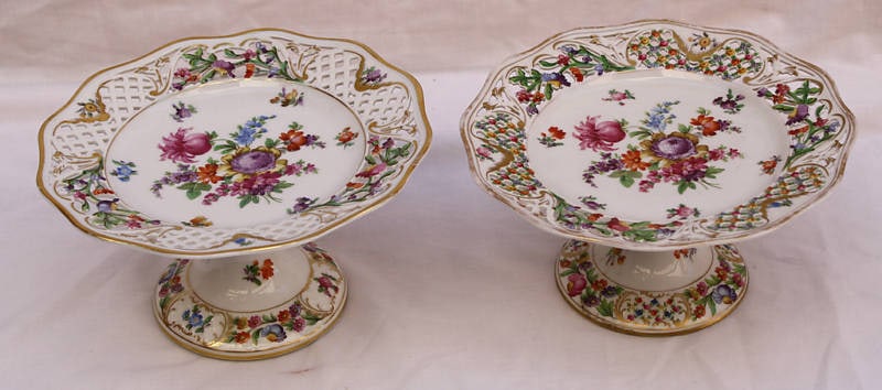 Exquisite Vintage 1900's Dresden Porcelain Footed Serving Dishes Pair: Exquisite Vintage 1900's Dresden Porcelain Footed Serving Dishes Pair This exquisite pair of original early 1900's Dresden porcelain center pieces showcases a vibrant multicolor hand-painted design. E