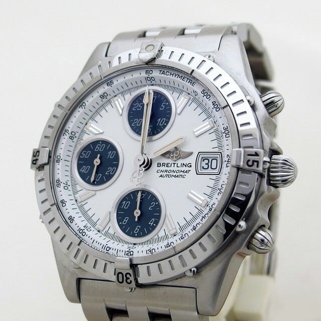 Breitling A13350 Chronomat wristwatch white dial automatic chronograph date: Breitling A13350 Chronomat wristwatch white dial automatic chronograph date Breitling Chronomat Chronograph Date men's wristwatch with a white dial, bar index markers, and automatic movement. This Swi