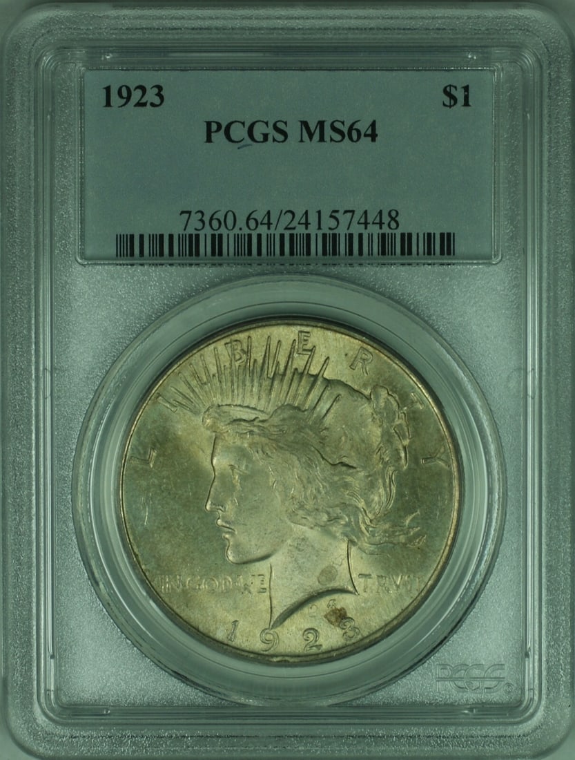PCGS MS-64 1923 Peace Silver Dollar Philadelphia Lightly Toned $1 Coin: PCGS MS-64 1923 Peace Silver Dollar Philadelphia Lightly Toned $1 Coin This is a 1923 Peace Silver Dollar $1 coin, certified by PCGS with a grade of MS-64. The coin is uncirculated and exhibits light 