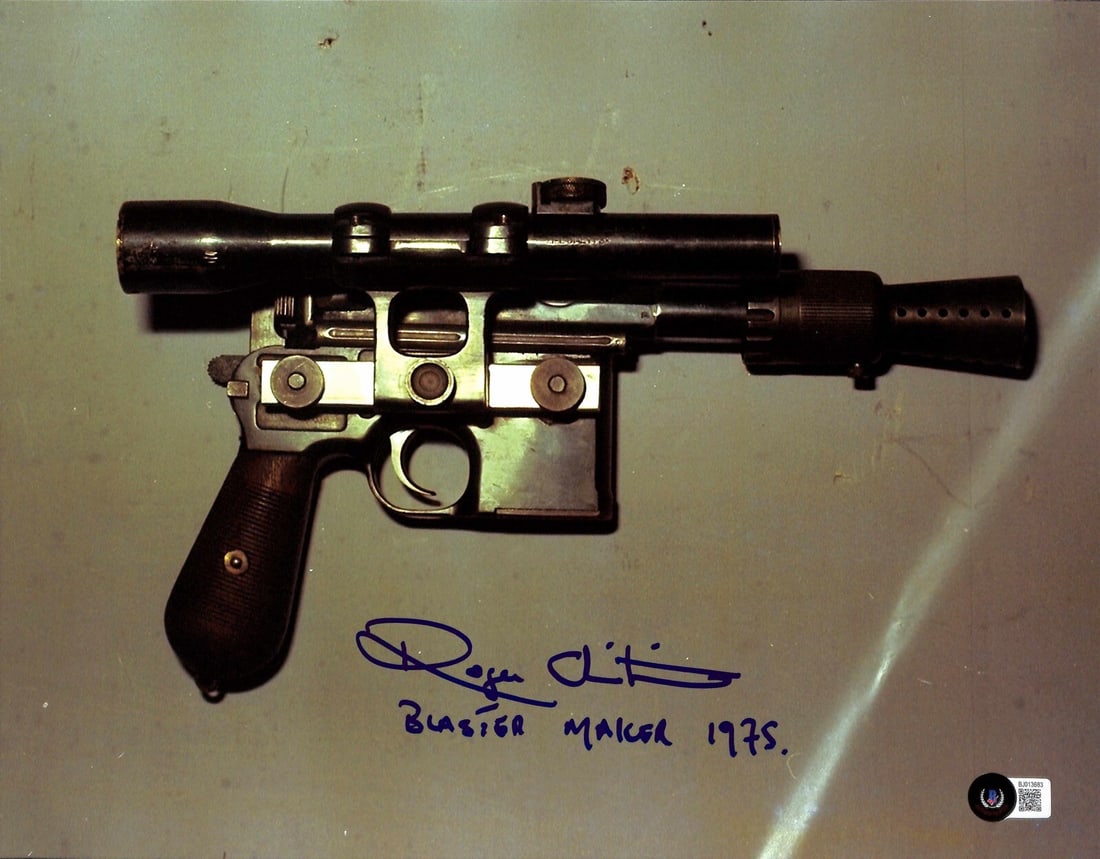 Signed 11x14 Star Wars Han Blaster Photo Roger Christian Beckett Authenticated: Signed 11x14 Star Wars Han Blaster Photo Roger Christian Beckett Authenticated Original autographed 11x14 photograph signed by Roger Christian in blue permanent marker. The photo relates to Han's blas