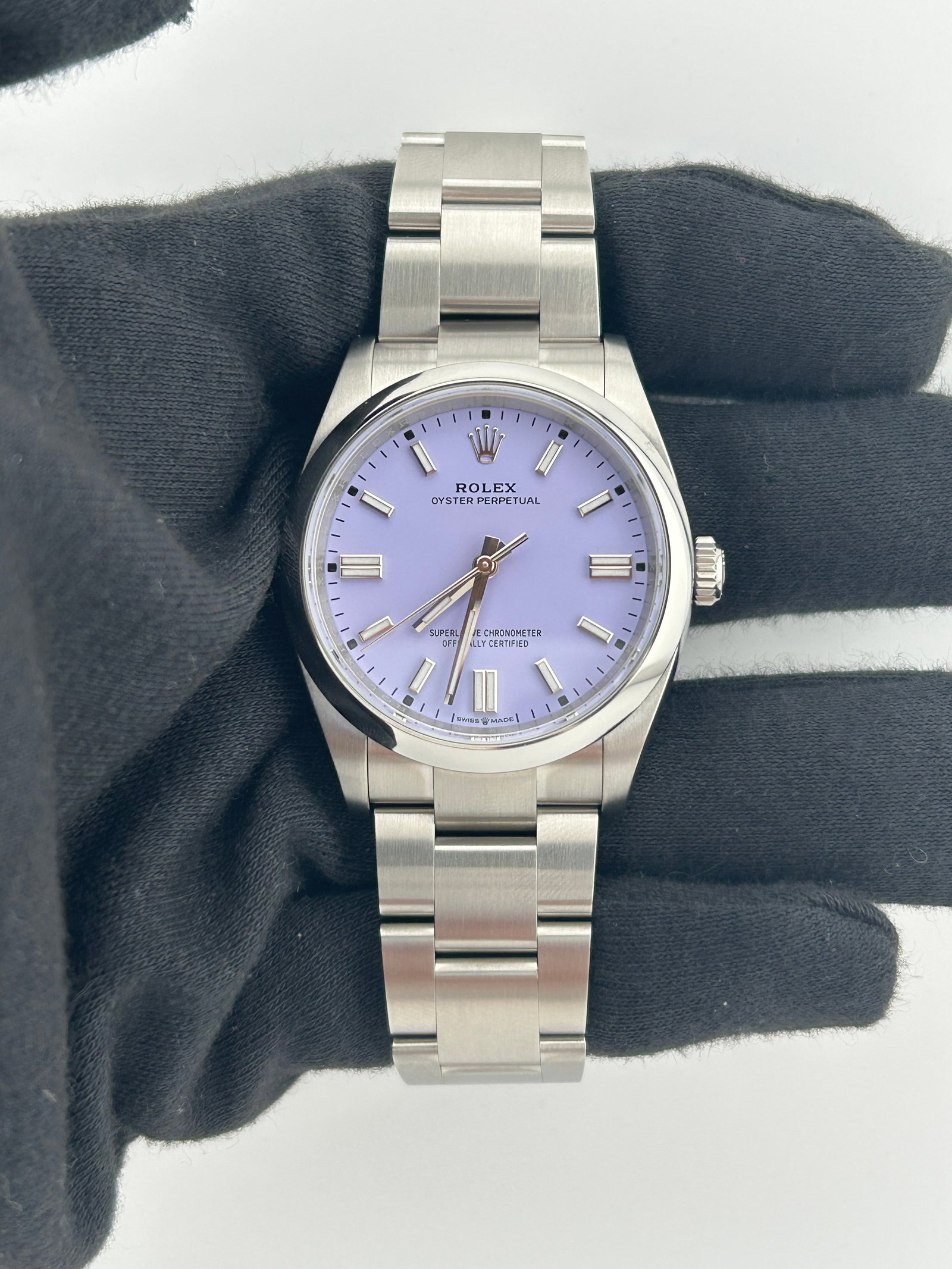 Rolex 126000 Oyster Perpetual 36 Mens Watch Lavender Dial Oyster Bracelet: Rolex 126000 Oyster Perpetual 36 Mens Watch Lavender Dial Oyster Bracelet Rolex Oyster Perpetual 36 wristwatch with a lavender dial, smooth bezel, and Oyster bracelet. This 2026 example is offered wit