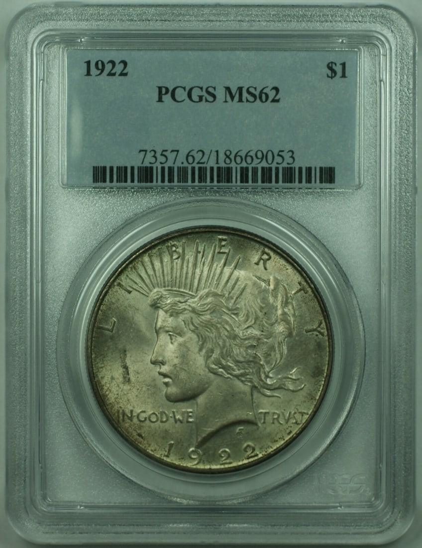 PCGS MS62 1922 Peace Dollar Silver $1 Toned Coin: PCGS MS62 1922 Peace Dollar Silver $1 Toned Coin This is a 1922 Peace Silver Dollar $1 coin from the United States, certified by PCGS with a grade of MS 62. The coin is uncirculated, features a silver
