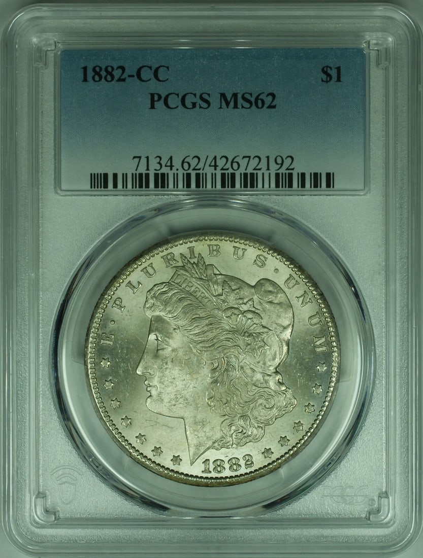 PCGS MS62 1882 CC Morgan Silver Dollar $1 Carson City: PCGS MS62 1882 CC Morgan Silver Dollar $1 Carson City This is an 1882-CC Morgan Silver Dollar coin from the United States, minted in Carson City. Certified by PCGS with a grade of MS 62, this uncircul