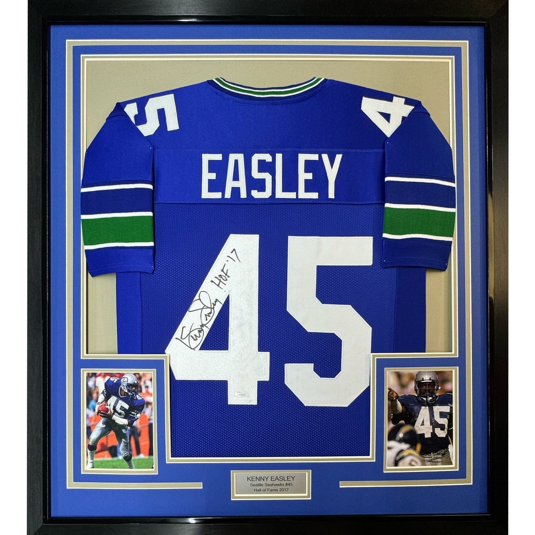 Kenny Easley Autographed Seattle Seahawks Blue Framed Jersey JSA 35x39: Kenny Easley Autographed Seattle Seahawks Blue Framed Jersey JSA 35x39 Professionally framed and matted signed Kenny Easley Seattle Seahawks blue jersey display with two 5x7 photos. This original foot