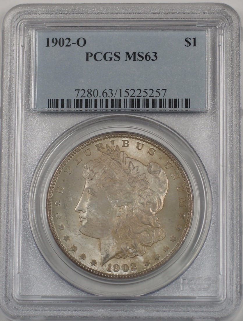 PCGS MS-63 1902-O Morgan Silver Dollar Toned Uncirculated: PCGS MS-63 1902-O Morgan Silver Dollar Toned Uncirculated 1902-O Morgan Silver Dollar $1 coin graded PCGS MS-63 with toned surfaces. This United States coin is an uncirculated pre-owned example certif
