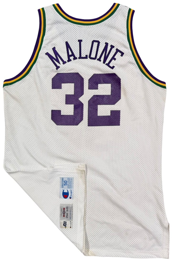 Karl Malone 1994-95 Utah Jazz Game Used Jersey Photo Matched COA: Karl Malone 1994-95 Utah Jazz Game Used Jersey Photo Matched COA Photo-matched 1994-95 Utah Jazz game-used Karl Malone jersey, accompanied by ResMatch and MeiGray match letters. The jersey is a white 