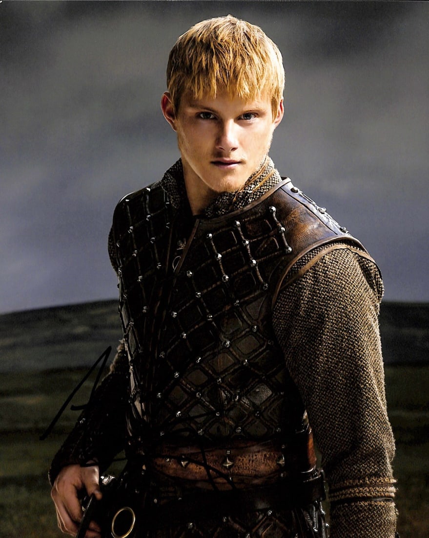 Beckett Certified 8x10 Photo Signed by Alexander Ludwig as Bjorn Lothbrok: Beckett Certified 8x10 Photo Signed by Alexander Ludwig as Bjorn Lothbrok Original autographed 8x10 photograph signed by Alexander Ludwig in black permanent marker. The photo references his role as Bj