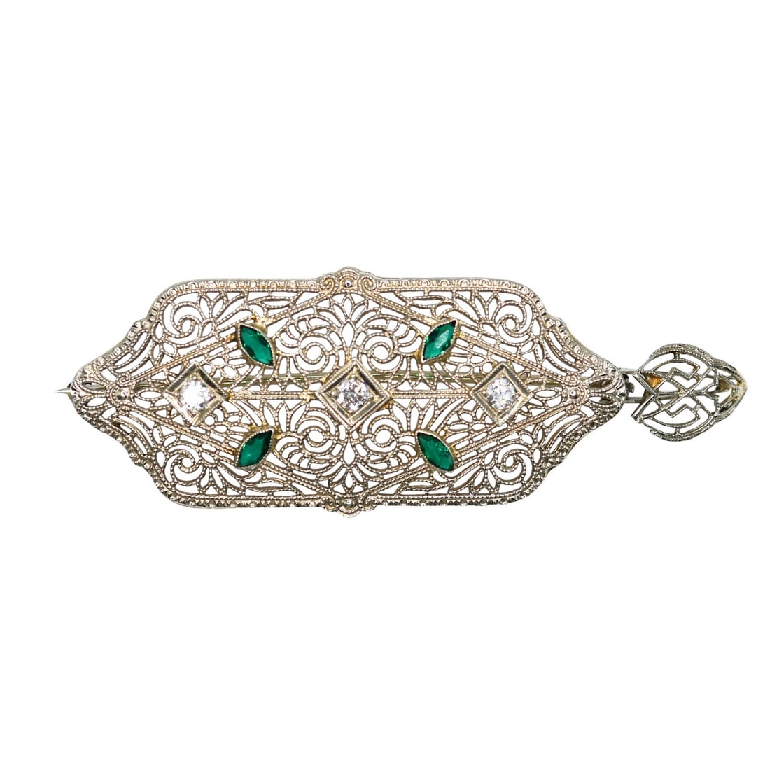 Art Deco 14K White Gold Brooch Pendant with Diamonds and Green Spinels: Art Deco 14K White Gold Brooch Pendant with Diamonds and Green Spinels Art Deco brooch/pendant crafted in 14k white gold with an openwork filigree design. This convertible piece features three round t