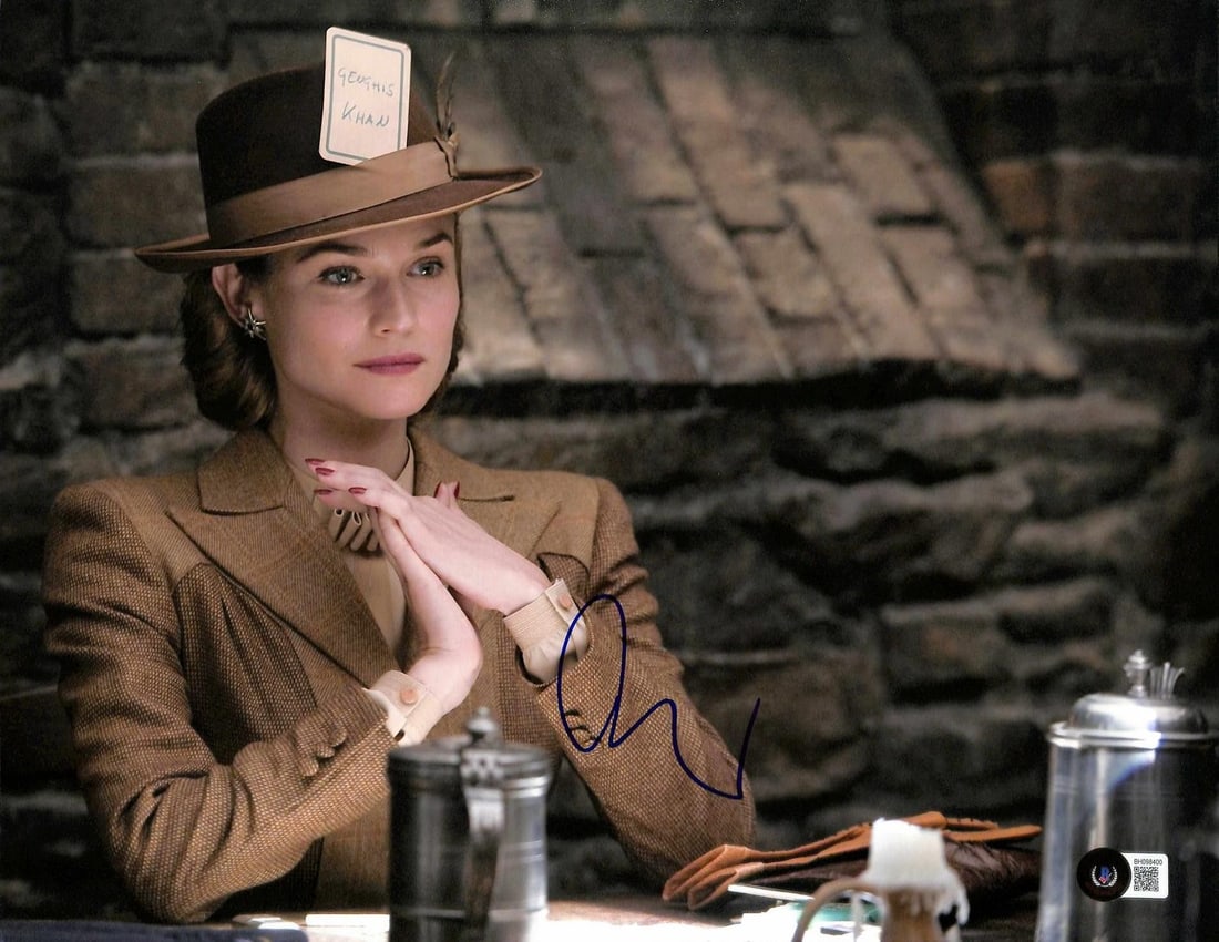 Beckett Authenticated 11x14 Diane Kruger Autographed Inglourious Basterds Photo: Beckett Authenticated 11x14 Diane Kruger Autographed Inglourious Basterds Photo Hand-signed 11x14 photograph from Inglourious Basterds featuring Diane Kruger. This pre-owned piece is authenticated by 