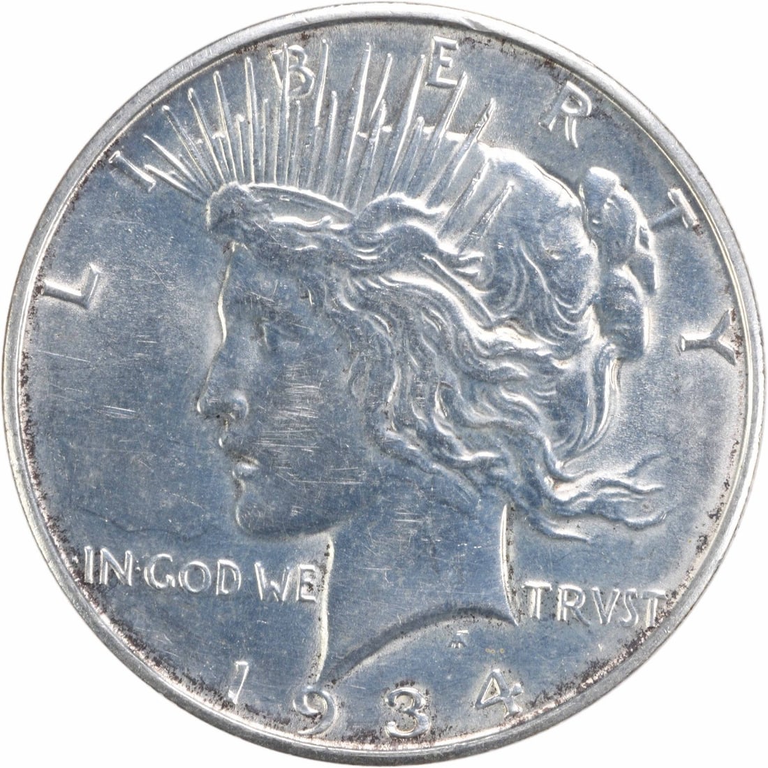 1934 D $1 Peace Dollar Silver AU Uncertified Coin: 1934 D $1 Peace Dollar Silver AU Uncertified Coin 1934-D Peace Silver Dollar in AU slider grade. This uncertified, pre-owned coin is a circulated example of the United States $1 Peace dollar series. S