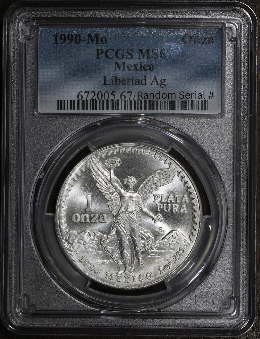 Mexico 1990-Mo Silver Libertad Onza 1 oz MS67 PCGS: Mexico 1990-Mo Silver Libertad Onza 1 oz MS67 PCGS 1990-Mo Mexico 1 oz Silver Libertad Onza certified by PCGS and graded MS67. This pre-owned Mexican Libertad coin is struck in .999 fine silver with 1