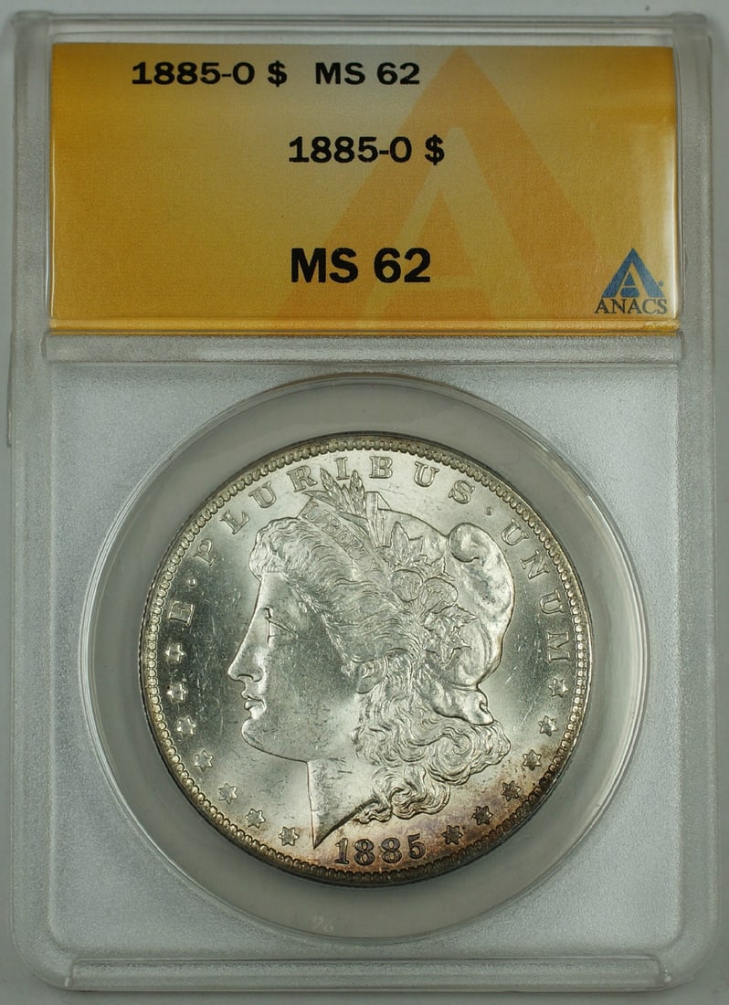 ANACS MS-62 1885-O Morgan silver dollar lightly toned: ANACS MS-62 1885-O Morgan silver dollar lightly toned This 1885-O Morgan Silver Dollar is certified by ANACS with a grade of MS 62. The coin is uncirculated and exhibits light toning. Minted in New Or