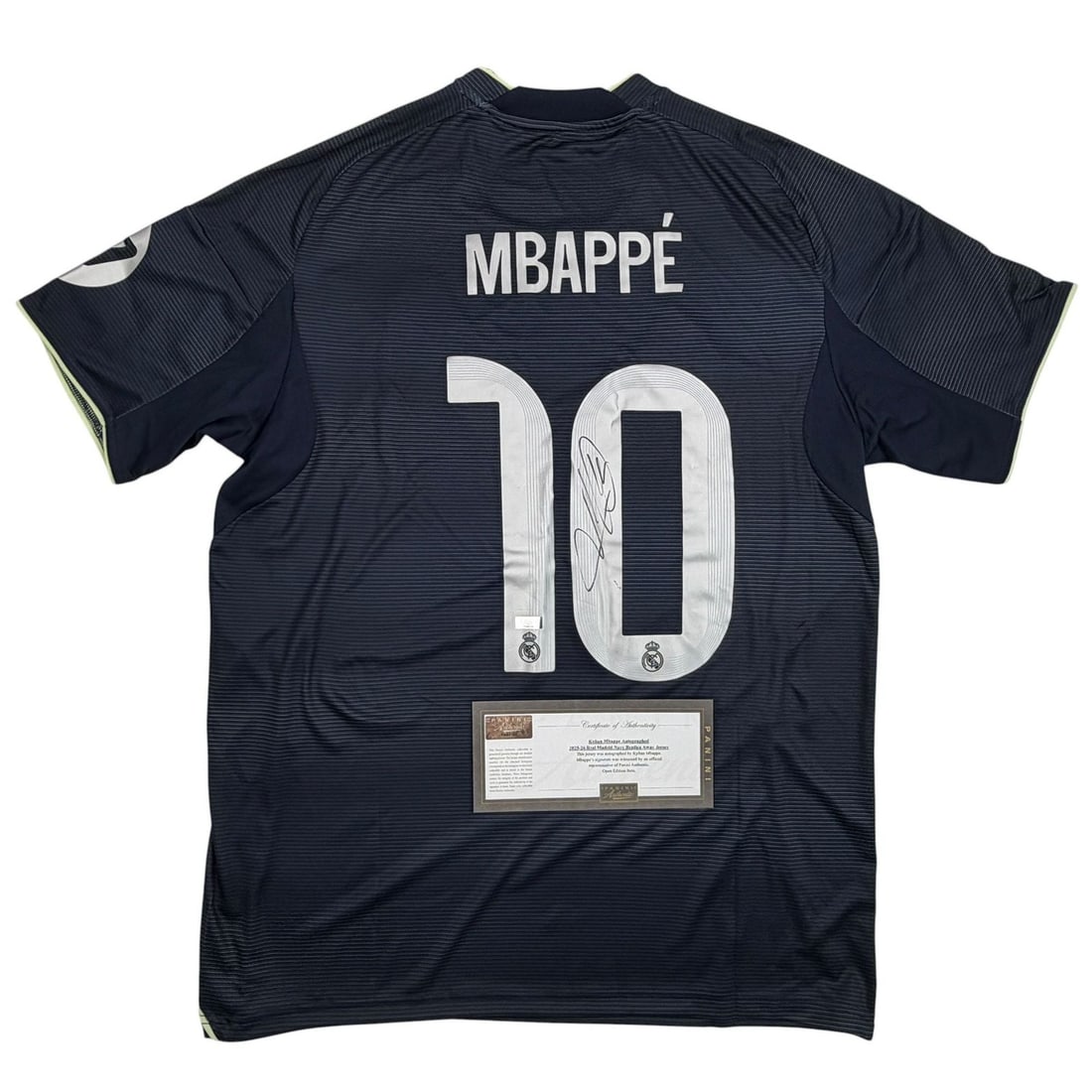 Real Madrid navy soccer jersey signed by Kylian Mbappe Panini Authentic: Real Madrid navy soccer jersey signed by Kylian Mbappe Panini Authentic Pre-owned navy soccer jersey signed by Kylian Mbappe. This Real Madrid jersey is an original autographed piece and includes Pani