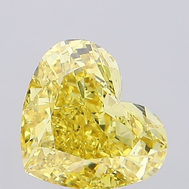Loose Diamond - HEART 8.68ct Fancy Vivid Yellow VS1: Loose Diamond - HEART 8.68ct Fancy Vivid Yellow VS1 Source: This is a real non-mined Diamond that has been grown in a lab Shape: HEART Carats: 8.68 Color: Fancy Vivid Yellow Certification: IGI Video: