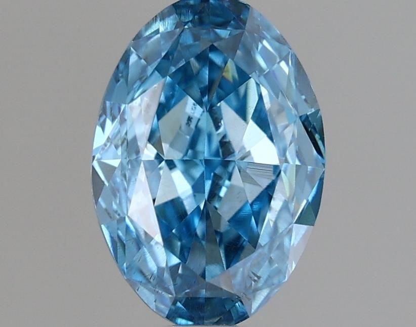 Loose Diamond - OVAL 1.08ct Fancy Vivid Blue SI2: Loose Diamond - OVAL 1.08ct Fancy Vivid Blue SI2 Source: This is a real non-mined Diamond that has been grown in a lab Shape: OVAL Carats: 1.08 Color: Fancy Vivid Blue Certification: IGI Video: