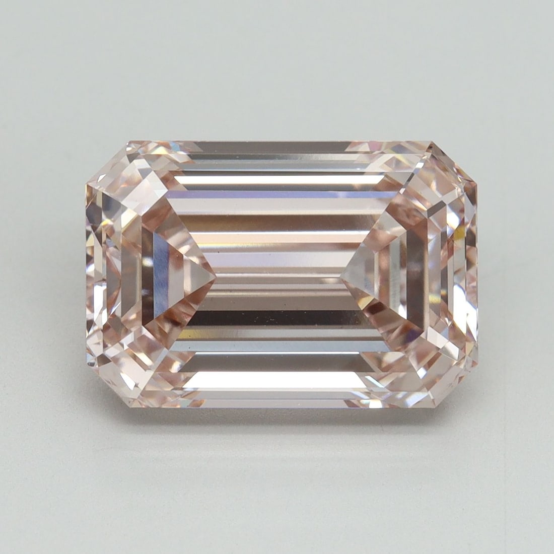 Loose Diamond - EMERALD 7.15ct Fancy Pink VS1: Loose Diamond - EMERALD 7.15ct Fancy Pink VS1 Source: This is a real non-mined Diamond that has been grown in a lab Shape: EMERALD Carats: 7.15 Color: Fancy Pink Certification: IGI Video: