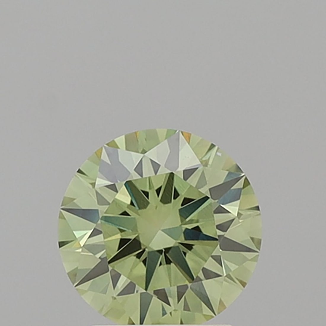 Ideal Loose Diamond - ROUND 2.08ct Fancy Vivid Green VS1: Ideal Loose Diamond - ROUND 2.08ct Fancy Vivid Green VS1 Source: This is a real non-mined Diamond that has been grown in a lab Shape: ROUND Carats: 2.08 Color: Fancy Vivid Green Certification: IGI Vid