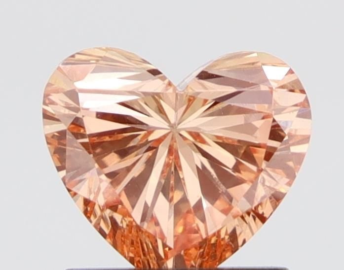 Loose Diamond - HEART 1.02ct Fancy Orange SI1: Loose Diamond - HEART 1.02ct Fancy Orange SI1 Source: This is a real non-mined Diamond that has been grown in a lab Shape: HEART Carats: 1.02 Color: Fancy Orange Certification: NONE Video: