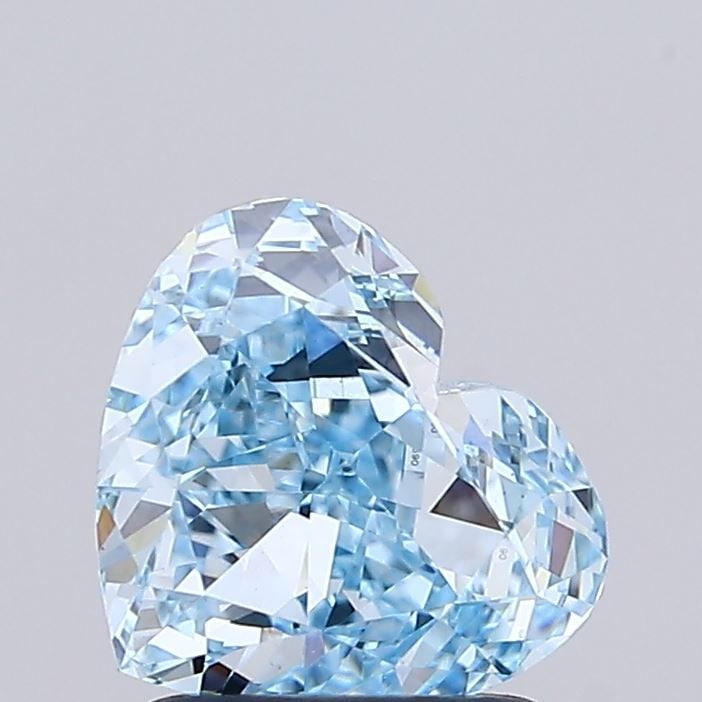 Loose Diamond - HEART 1.59ct Fancy Vivid Blue VVS2: Loose Diamond - HEART 1.59ct Fancy Vivid Blue VVS2 Source: This is a real non-mined Diamond that has been grown in a lab Shape: HEART Carats: 1.59 Color: Fancy Vivid Blue Certification: IGI Video: