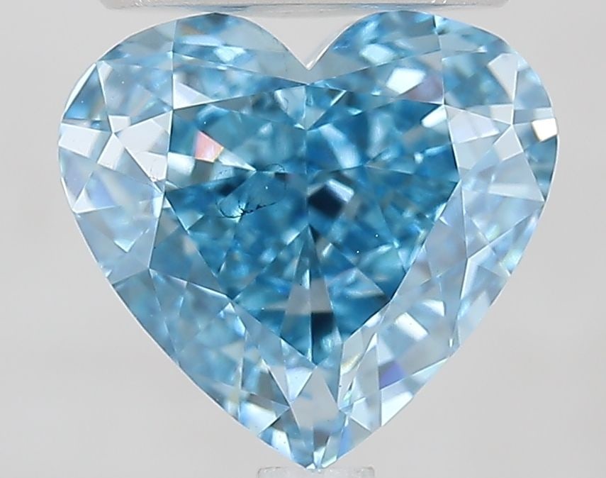 Loose Diamond - HEART 3.05ct Fancy Vivid Blue VS2: Loose Diamond - HEART 3.05ct Fancy Vivid Blue VS2 Source: This is a real non-mined Diamond that has been grown in a lab Shape: HEART Carats: 3.05 Color: Fancy Vivid Blue Certification: IGI Additional 