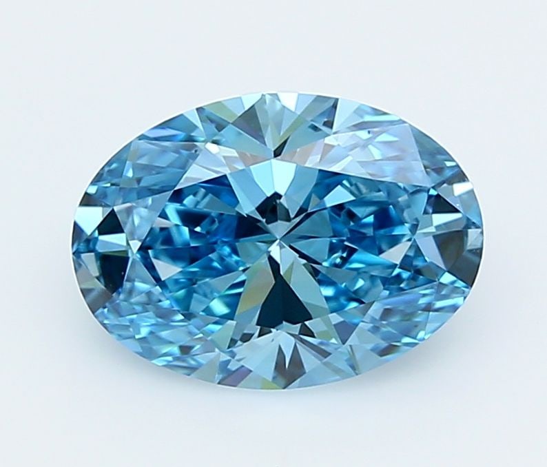 Loose Diamond - OVAL 2.24ct Fancy Vivid Blue VVS1: Loose Diamond - OVAL 2.24ct Fancy Vivid Blue VVS1 Source: This is a real non-mined Diamond that has been grown in a lab Shape: OVAL Carats: 2.24 Color: Fancy Vivid Blue Certification: IGI Video: