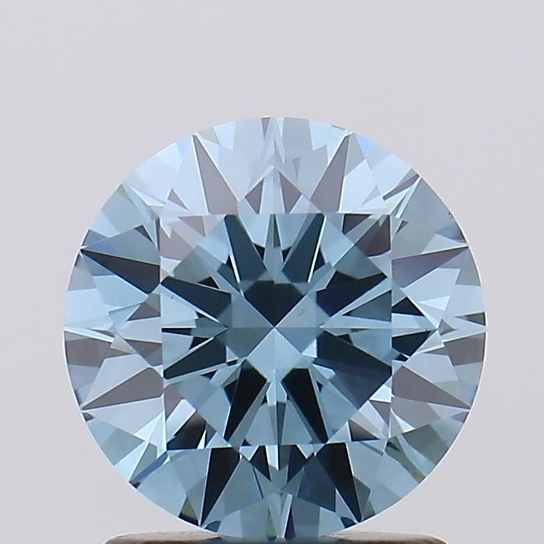 Loose Diamond - ROUND 1.5ct Fancy Vivid Blue VS1: Loose Diamond - ROUND 1.5ct Fancy Vivid Blue VS1 Source: This is a real non-mined Diamond that has been grown in a lab Shape: ROUND Carats: 1.5 Color: Fancy Vivid Blue Certification: IGI Video: Video