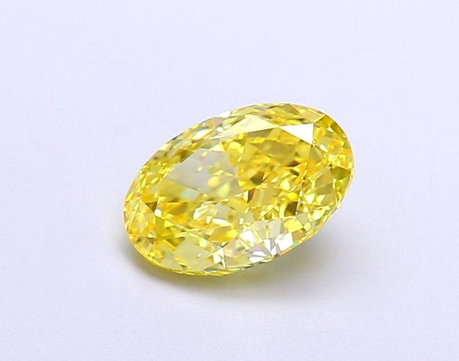 Loose Diamond - OVAL 1.28ct Fancy Vivid Yellow VS1: Loose Diamond - OVAL 1.28ct Fancy Vivid Yellow VS1 Source: This is a real non-mined Diamond that has been grown in a lab Shape: OVAL Carats: 1.28 Color: Fancy Vivid Yellow Certification: IGI Video: