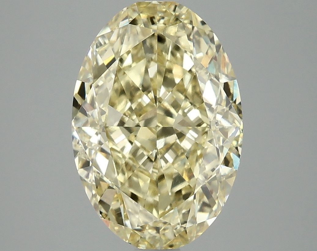 Loose Diamond - OVAL 4.08ct Fancy Vivid Yellow VS1: Loose Diamond - OVAL 4.08ct Fancy Vivid Yellow VS1 Source: This is a real non-mined Diamond that has been grown in a lab Shape: OVAL Carats: 4.08 Color: Fancy Vivid Yellow Certification: IGI Video: