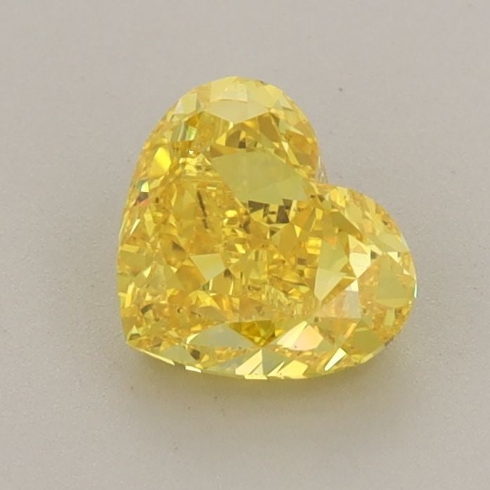 Loose Diamond - HEART 1.02ct Fancy Vivid Yellow VS1: Loose Diamond - HEART 1.02ct Fancy Vivid Yellow VS1 Source: This is a real non-mined Diamond that has been grown in a lab Shape: HEART Carats: 1.02 Color: Fancy Vivid Yellow Certification: IGI Video: