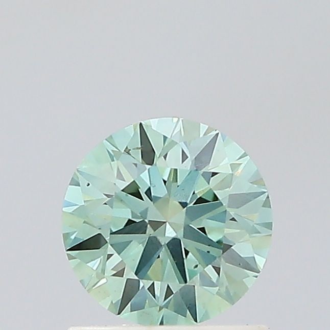 Ideal Loose Diamond - ROUND 0.93ct Fancy Vivid Green VS1: Ideal Loose Diamond - ROUND 0.93ct Fancy Vivid Green VS1 Source: This is a real non-mined Diamond that has been grown in a lab Shape: ROUND Carats: 0.93 Color: Fancy Vivid Green Certification: IGI Vid