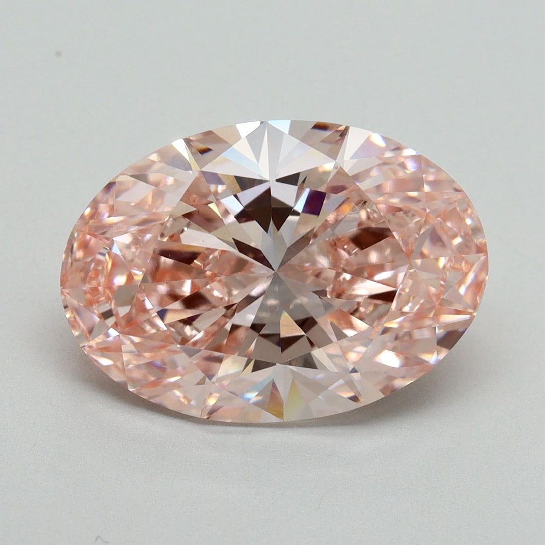 Loose Diamond - OVAL 6.11ct Fancy Vivid Pink VS1: Loose Diamond - OVAL 6.11ct Fancy Vivid Pink VS1 Source: This is a real non-mined Diamond that has been grown in a lab Shape: OVAL Carats: 6.11 Color: Fancy Vivid Pink Certification: IGI Video: