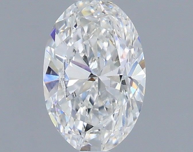 Loose Diamond - OVAL 0.71ct E VVS2: Loose Diamond - OVAL 0.71ct E VVS2 Source: This is a real non-mined Diamond that has been grown in a lab Shape: OVAL Carats: 0.71 Color: E Clarity: VVS2 Certification: IGI Video: