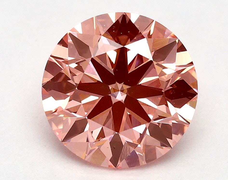 Ideal Loose Diamond - ROUND 1.81ct Fancy Vivid Pink VS1: Ideal Loose Diamond - ROUND 1.81ct Fancy Vivid Pink VS1 Source: This is a real non-mined Diamond that has been grown in a lab Shape: ROUND Carats: 1.81 Color: Fancy Vivid Pink Certification: IGI Video