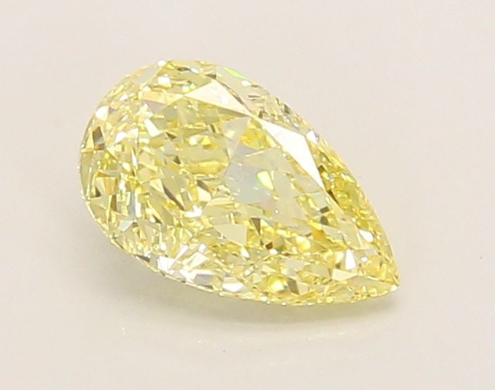 Loose Diamond - PEAR 1.03ct Fancy Intense Yellow VVS2: Loose Diamond - PEAR 1.03ct Fancy Intense Yellow VVS2 Source: This is a real non-mined Diamond that has been grown in a lab Shape: PEAR Carats: 1.03 Color: Fancy Intense Yellow Certification: IGI Vide