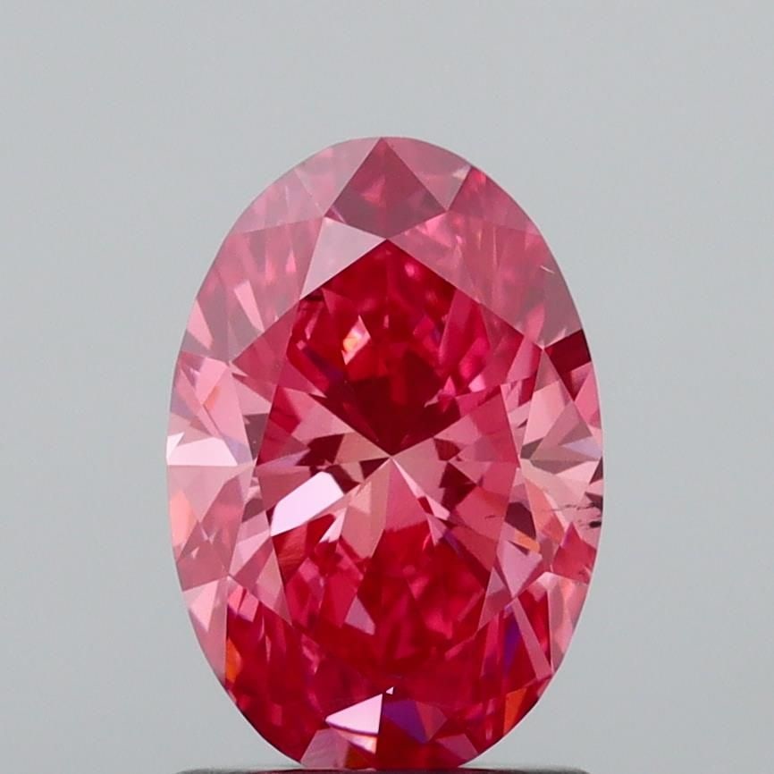 Loose Diamond - OVAL 1.3ct Fancy Vivid Pink VS2: Loose Diamond - OVAL 1.3ct Fancy Vivid Pink VS2 Source: This is a real non-mined Diamond that has been grown in a lab Shape: OVAL Carats: 1.3 Color: Fancy Vivid Pink Certification: IGI Video: