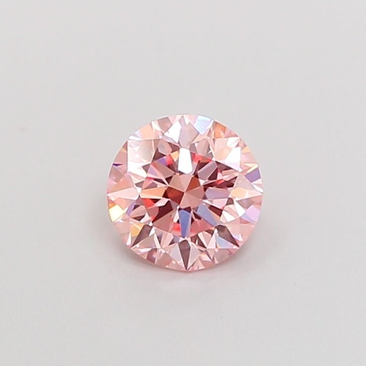Loose Diamond - ROUND 1.04ct Fancy Vivid Pink VS1: Loose Diamond - ROUND 1.04ct Fancy Vivid Pink VS1 Source: This is a real non-mined Diamond that has been grown in a lab Shape: ROUND Carats: 1.04 Color: Fancy Vivid Pink Certification: IGI Video: