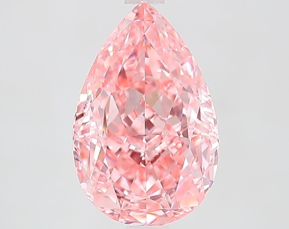 Loose Diamond - PEAR 3.51ct Fancy Vivid Pink VVS2: Loose Diamond - PEAR 3.51ct Fancy Vivid Pink VVS2 Source: This is a real non-mined Diamond that has been grown in a lab Shape: PEAR Carats: 3.51 Color: Fancy Vivid Pink Certification: IGI Video: