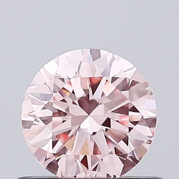 Loose Diamond - ROUND 0.6ct Fancy Intense Pink VS1: Loose Diamond - ROUND 0.6ct Fancy Intense Pink VS1 Source: This is a real non-mined Diamond that has been grown in a lab Shape: ROUND Carats: 0.6 Color: Fancy Intense Pink Certification: IGI Video: