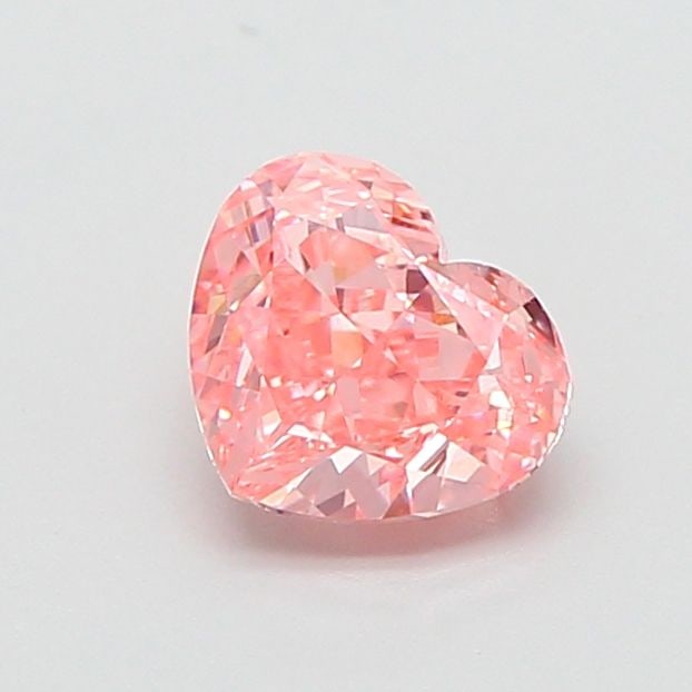Loose Diamond - HEART 0.91ct Fancy Vivid Pink VVS2: Loose Diamond - HEART 0.91ct Fancy Vivid Pink VVS2 Source: This is a real non-mined Diamond that has been grown in a lab Shape: HEART Carats: 0.91 Color: Fancy Vivid Pink Certification: IGI Video: