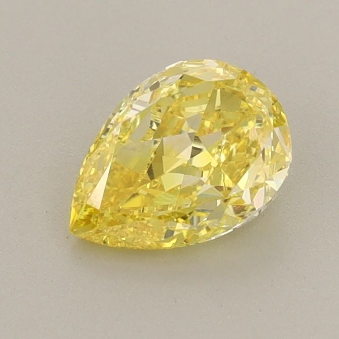Loose Diamond - PEAR 0.74ct Fancy Vivid Yellow VS1: Loose Diamond - PEAR 0.74ct Fancy Vivid Yellow VS1 Source: This is a real non-mined Diamond that has been grown in a lab Shape: PEAR Carats: 0.74 Color: Fancy Vivid Yellow Certification: IGI Video: