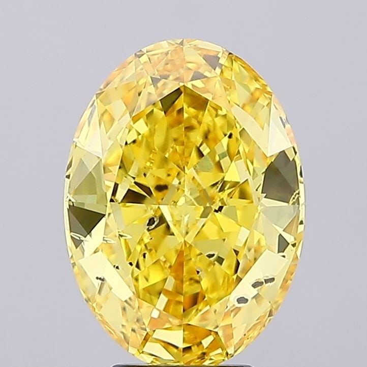 Loose Diamond - OVAL 5.04ct Fancy Vivid Yellow SI2: Loose Diamond - OVAL 5.04ct Fancy Vivid Yellow SI2 Source: This is a real non-mined Diamond that has been grown in a lab Shape: OVAL Carats: 5.04 Color: Fancy Vivid Yellow Certification: IGI Video: