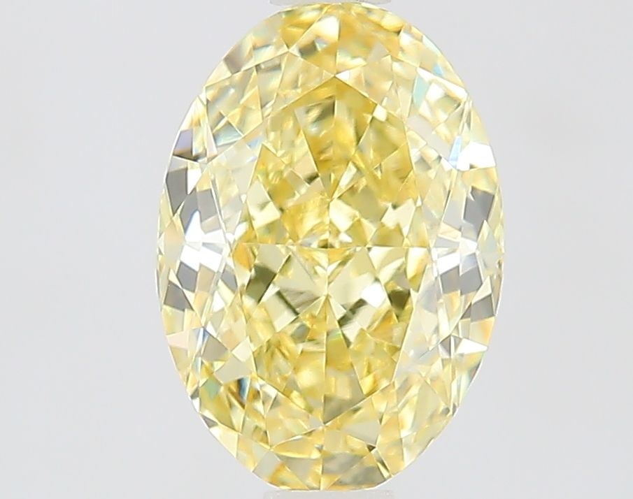 Loose Diamond - OVAL 1.43ct Fancy Yellow VVS2: Loose Diamond - OVAL 1.43ct Fancy Yellow VVS2 Source: This is a real non-mined Diamond that has been grown in a lab Shape: OVAL Carats: 1.43 Color: Fancy Yellow Certification: IGI Video: