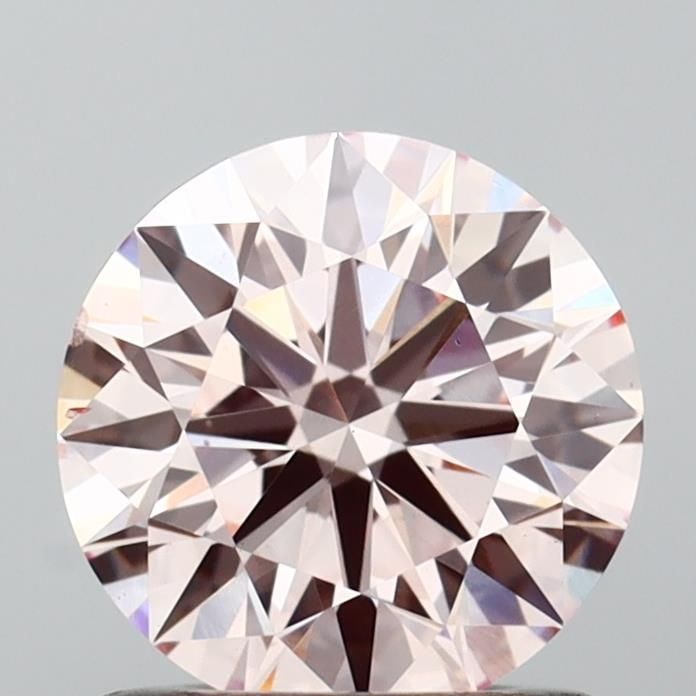 Ideal Loose Diamond - ROUND 0.92ct Fancy Pink VS2: Ideal Loose Diamond - ROUND 0.92ct Fancy Pink VS2 Source: This is a real non-mined Diamond that has been grown in a lab Shape: ROUND Carats: 0.92 Color: Fancy Pink Certification: IGI Video: