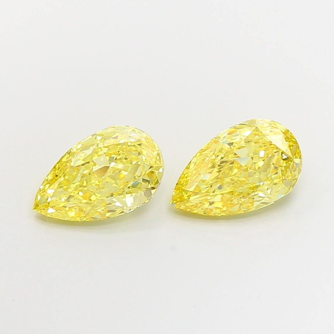 Loose Diamond - PEAR 3.01ct Fancy Vivid Yellow VS1: Loose Diamond - PEAR 3.01ct Fancy Vivid Yellow VS1 Source: This is a real non-mined Diamond that has been grown in a lab Shape: PEAR Carats: 3.01 Color: Fancy Vivid Yellow Certification: IGI Video: