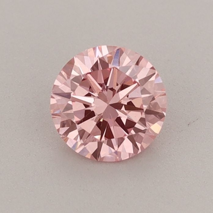 Loose Diamond - ROUND 0.54ct Fancy Vivid Pink VS1: Loose Diamond - ROUND 0.54ct Fancy Vivid Pink VS1 Source: This is a real non-mined Diamond that has been grown in a lab Shape: ROUND Carats: 0.54 Color: Fancy Vivid Pink Certification: IGI Additional 