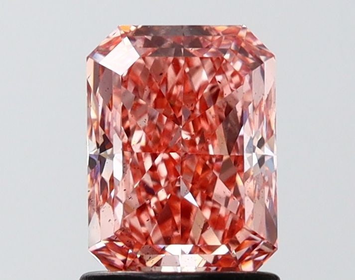 Loose Diamond - RADIANT 1.5ct Fancy Vivid Pink SI1: Loose Diamond - RADIANT 1.5ct Fancy Vivid Pink SI1 Source: This is a real non-mined Diamond that has been grown in a lab Shape: RADIANT Carats: 1.5 Color: Fancy Vivid Pink Certification: IGI Video: