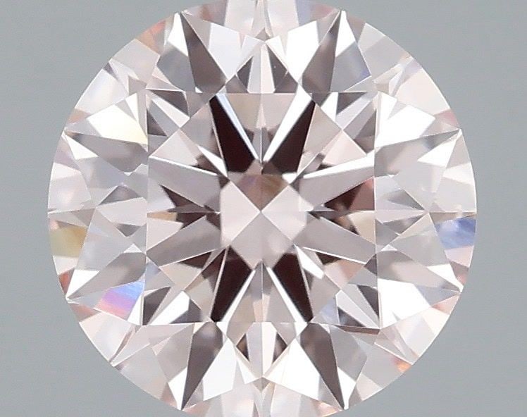 Ideal Loose Diamond - ROUND 1.51ct Fancy Pink VVS2: Ideal Loose Diamond - ROUND 1.51ct Fancy Pink VVS2 Source: This is a real non-mined Diamond that has been grown in a lab Shape: ROUND Carats: 1.51 Color: Fancy Pink Certification: IGI Video: