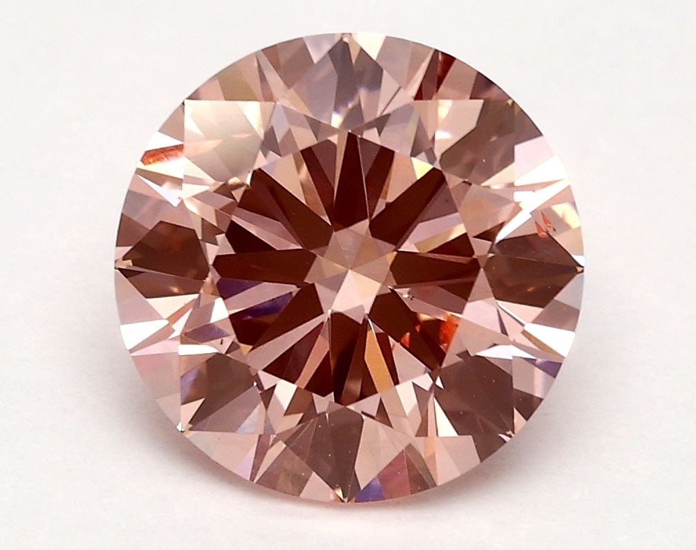 Ideal Loose Diamond - ROUND 2.03ct Fancy Vivid Pink SI1: Ideal Loose Diamond - ROUND 2.03ct Fancy Vivid Pink SI1 Source: This is a real non-mined Diamond that has been grown in a lab Shape: ROUND Carats: 2.03 Color: Fancy Vivid Pink Certification: IGI Video