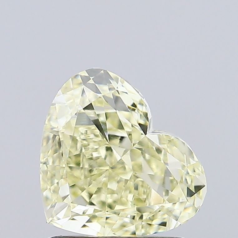 Loose Diamond - HEART 1.37ct Fancy Light Yellow VVS2: Loose Diamond - HEART 1.37ct Fancy Light Yellow VVS2 Source: This is a real non-mined Diamond that has been grown in a lab Shape: HEART Carats: 1.37 Color: Fancy Light Yellow Certification: IGI Video: